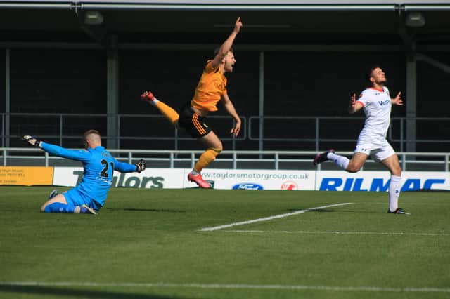 Jake Wright jnr celebrates in mid-air. Photo: Oliver Atkin