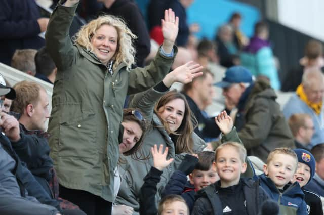 Fans watch Boston United v AFC Fylde.