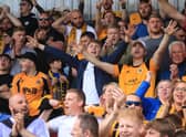 United fans were in full voice at York. Photo: Oliver Atkin