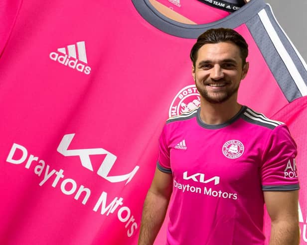 Tom Platt modelled Boston United's new away kit.