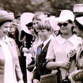 The Queen and Prince Philip meet well wishers in the crowd at RAF College Cranwell when they visited to celebrate its 50th anniversary in June 1970. EMN-210904-125011001