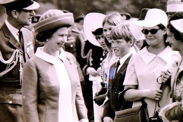 The Queen and Prince Philip meet well wishers in the crowd at RAF College Cranwell when they visited to celebrate its 50th anniversary in June 1970. EMN-210904-125011001