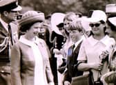 The Queen and Prince Philip meet well wishers in the crowd at RAF College Cranwell when they visited to celebrate its 50th anniversary in June 1970. EMN-210904-125011001