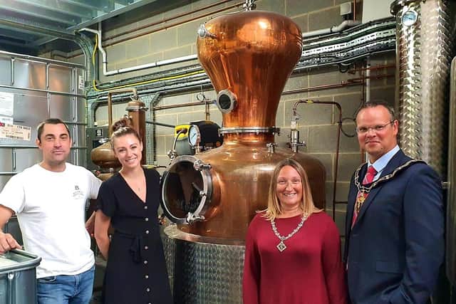 Alan Bottomley and Amy Conyard, from Bottomley Distillers, received a visit from the Mayor and Mayoress last year.