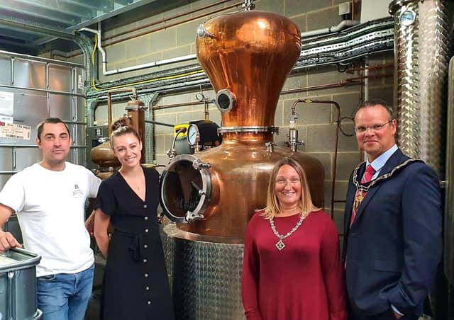 Alan Bottomley and Amy Conyard, from Bottomley Distillers, received a visit from the Mayor and Mayoress last year.