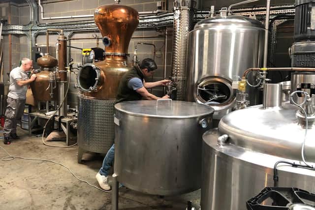 Working hard at Bottomley Distillers in Louth.