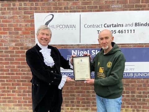 Mr McGarel receives his award. Photo: Boston CC