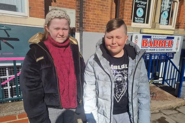 Brannon Cassidy sporting his new hair cut in Skegness, with his nine-year-old sister, Ruby. This was his first hair cut in a year and he said it was over his ears before his cut.