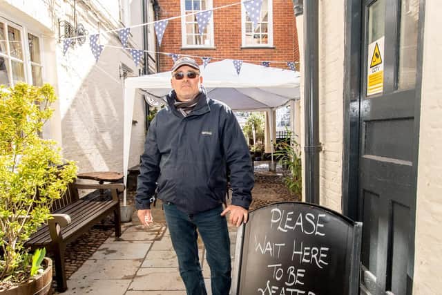 Owner Tim Mills in the newly extended outdoor seating area at The Bull Hotel
