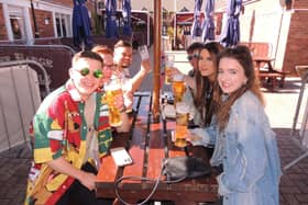 Getting their first beers in at the Barge and Bottle pub in Sleaford. EMN-211204-163347001