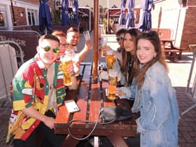 Getting their first beers in at the Barge and Bottle pub in Sleaford. EMN-211204-163347001