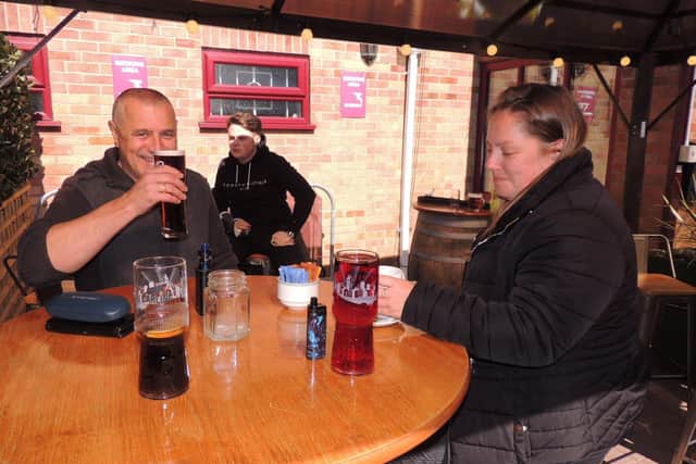 Cheers - Mick Lightfoot and Mandy Cotterill said it was great to get back to the Barge and Bottle in Sleaford. EMN-211204-163357001