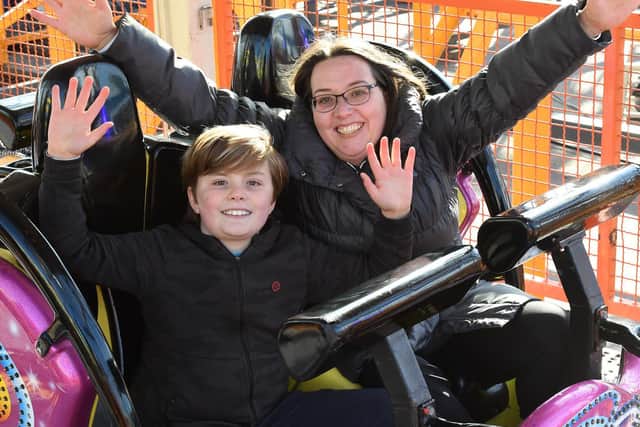 Kim Mills and Joseph Mills, 10, of Lemmington Spa on the new Spinning Racer at Fantasy Island in Ingoldmells. Kim said: 'It was really exciting and an adrenaline rush'.