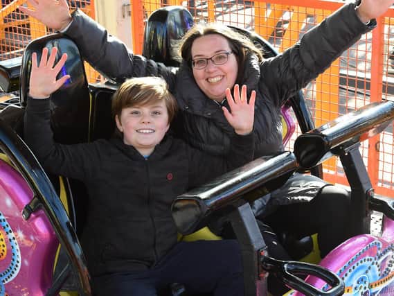 Kim Mills and Joseph Mills, 10, of Lemmington Spa on the new Spinning Racer at Fantasy Island in Ingoldmells. Kim said: 'It was really exciting and an adrenaline rush'.