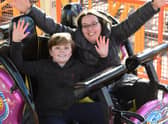 Kim Mills and Joseph Mills, 10, of Lemmington Spa on the new Spinning Racer at Fantasy Island in Ingoldmells. Kim said: 'It was really exciting and an adrenaline rush'.