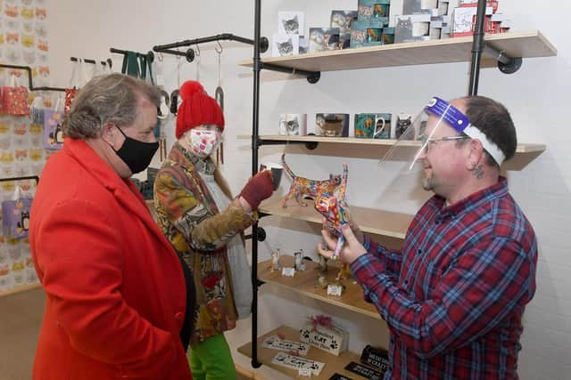 Rick and Gina Franks of Skegness with Martin Cawthorn of Purrfect Paws gift shop.
Rick and Gina said: 'It's great, an asset for Skegness'.