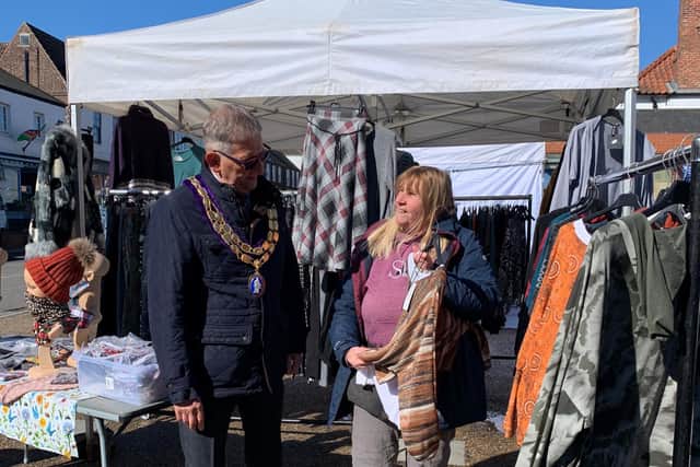 Mayor of Spilsby Coun Terry Taylor chats to a trader on Spilsby market.