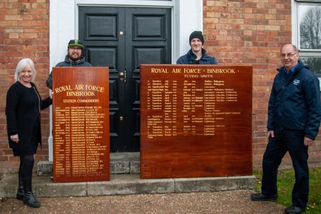 Return of the boards: from left, Christine Wyld, Senior Coordinator His Church, Cormac Taylor and Sam Teague from the His Church Buildings Restoration Team and Phil Panton, Director, Lincolnshire Aviation Heritage Centre.