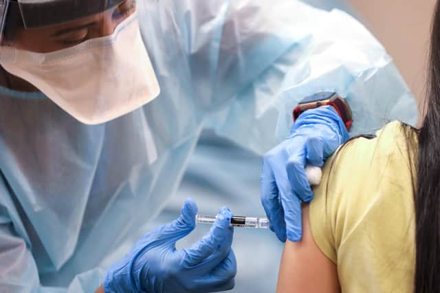 Covid-19 injection. (Photo by Mario Tama/Getty Images)