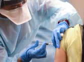 Covid-19 injection.  (Photo by Mario Tama/Getty Images)