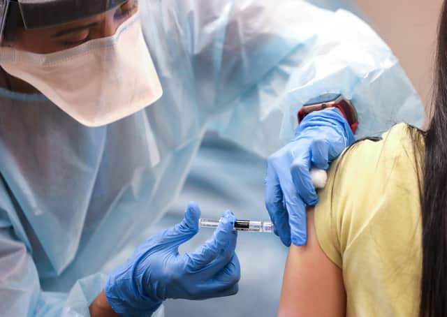 Covid-19 injection. (Photo by Mario Tama/Getty Images)