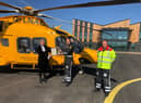 The High Sheriff of Lincolnshire, Michael Scott, presented the award to chief pilot Llewis Ingamells