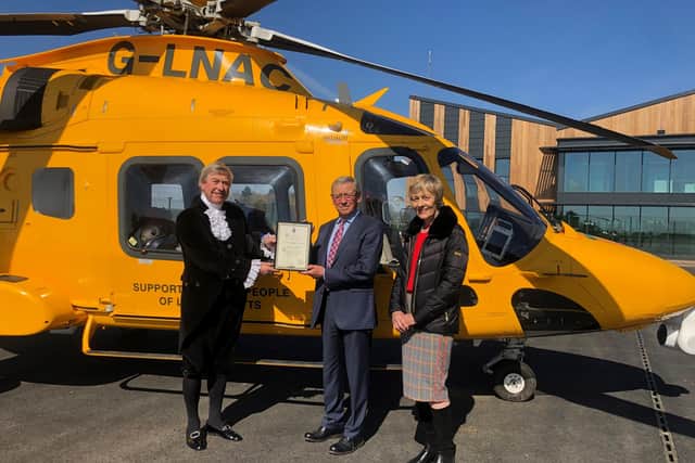 Jamie Burtt receives the award on behalf of the Lincolnshire Air Ambulance County Appeal