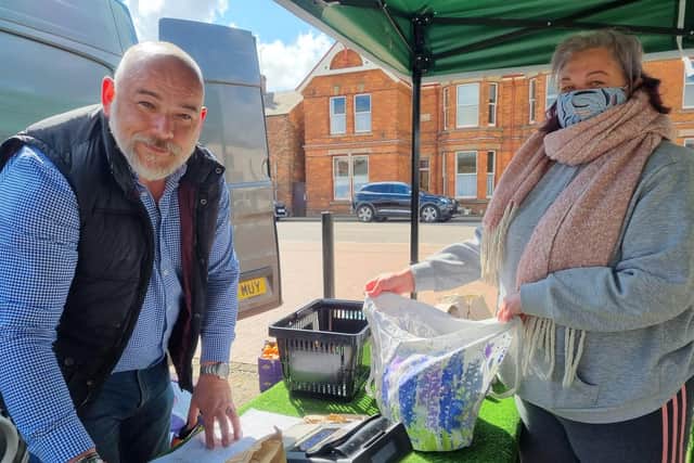 Chef Helen Proudley stocking up on fruit and veg.