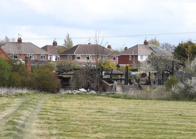 The burned remains of a barn, off The Drove, Sleaford. EMN-210416-180239001