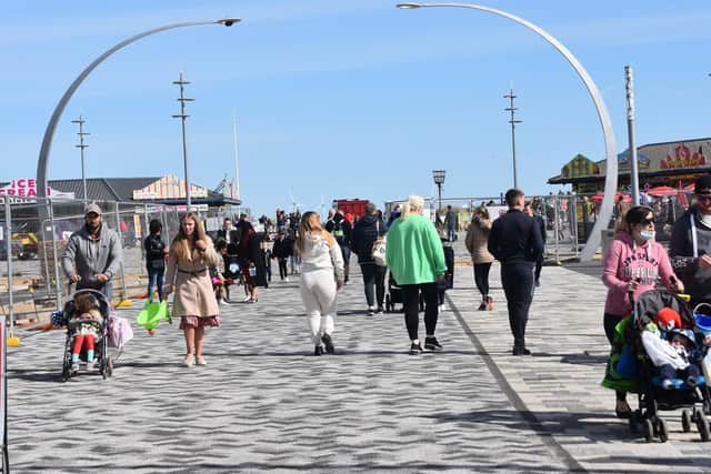 Visitors yesterday on the new pedestrianised walk to the beach in Skegness. Photo: Barry Robinson.