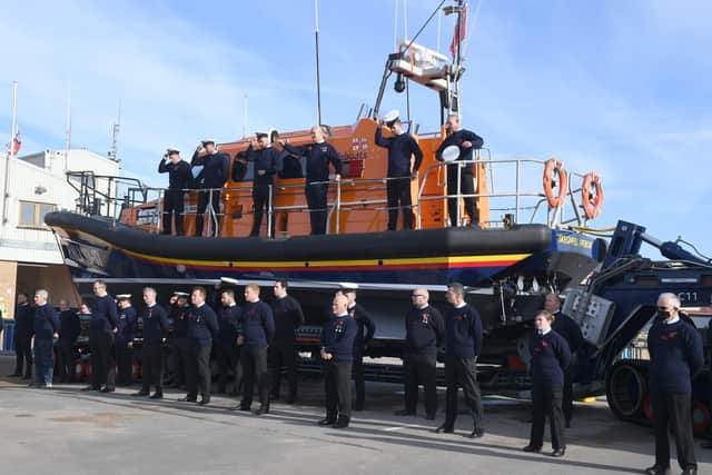 The RNLI saluted the funeral cortege of their former coxwain Richard Watson when it stopped briefly at the lifeboat station.