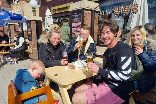 Cheers - these visitors from Chesterfield were delighted to be back in Skegness enjoying the sunshine.