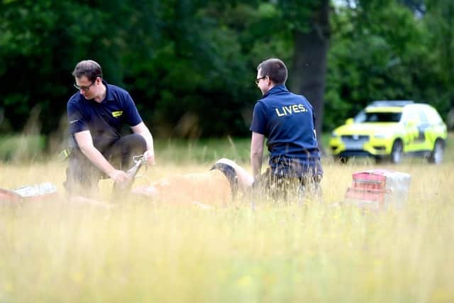 LIVES first responders helping a patient at the scene of an emergency incident.