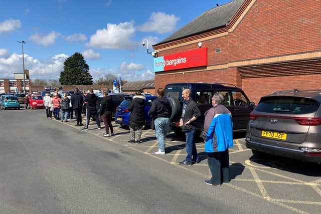 The queue at the parking meter at Hildreds Shopping Centre this morning.