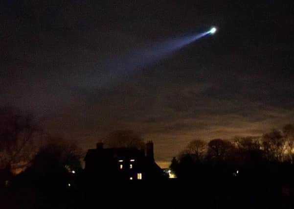 The force helicopter hovers over Horncastle after three teenagers sparked a major police response. Picture: Richard Giles.
