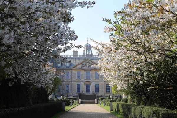 Belton house in blossom. EMN-210422-104242001