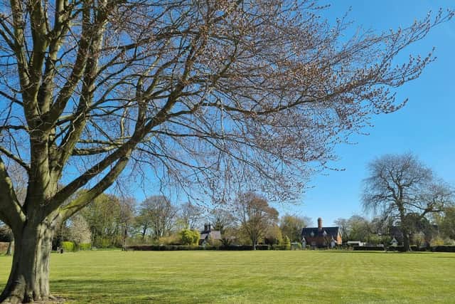 The village green is a popular view for the residents.