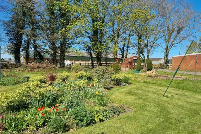 As well as a front lawn and small rear garden area, residents have access to an allotment area to grow vegetables and flowers.