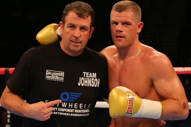 Callum Johnson with coach Joe Gallagher. Photo: Getty Images