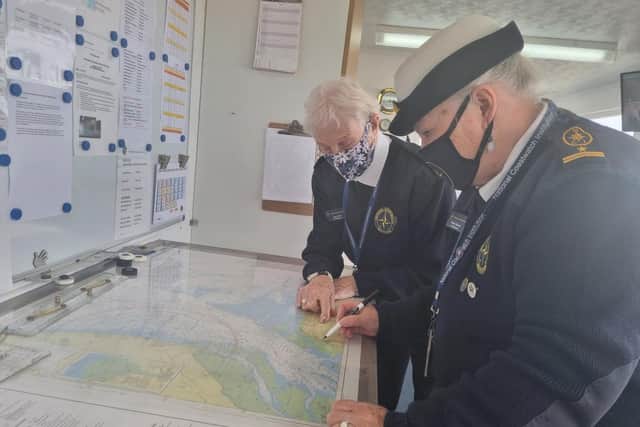 Station manager Norma Stewart and watchkeeper Jean Allen have both been trained at plotting charts.