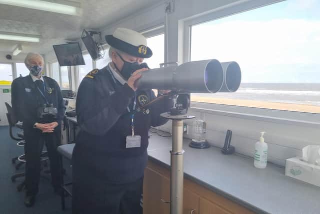 High powered telescopes help Station manager, Norma Stewart (right) and watchkeeper Jean Allen observe a vast section of beach.