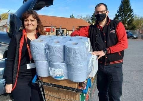 Rachael Hockmeyer and Christian Slingsby donate goods from their Spar shop to Rainbow Stars. EMN-210305-093903001
