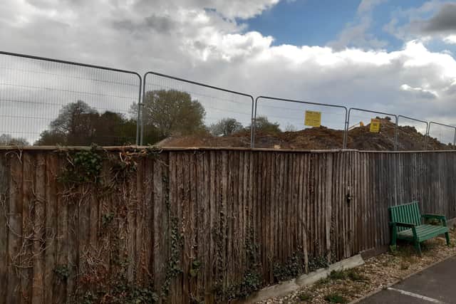 Spriggs Close resident Peter Cole says he will be faced with a 11-12ft expanse of fence looming over his home and garden. EMN-210429-124308001