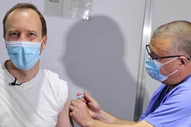 Prof Van Tam injects Matt Hancock with the vaccination