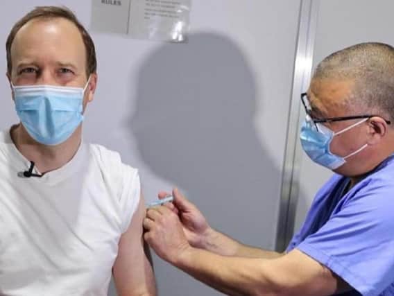 Prof Van Tam injects Matt Hancock with the vaccination