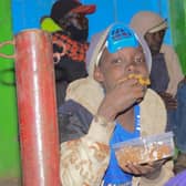 Feeding street families in Kenya.