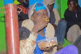 Feeding street families in Kenya.