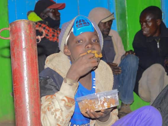 Feeding street families in Kenya.