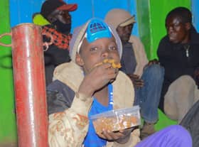 Feeding street families in Kenya.