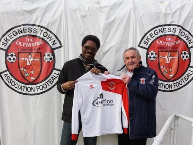 Allan Gray (right).